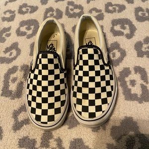 Checkered Vans.